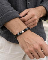 Quiet Guard — Silver Sheen Obsidian — A different gesture