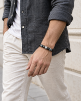 Quiet Guard — Silver Sheen Obsidian — An outfit in motion