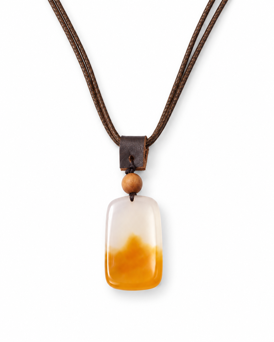 Autumn Snow — enlarged cream and amber pendant and lower cord V on white