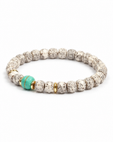 Turquoise toned magnesite Bodhi Accent bracelet on white background