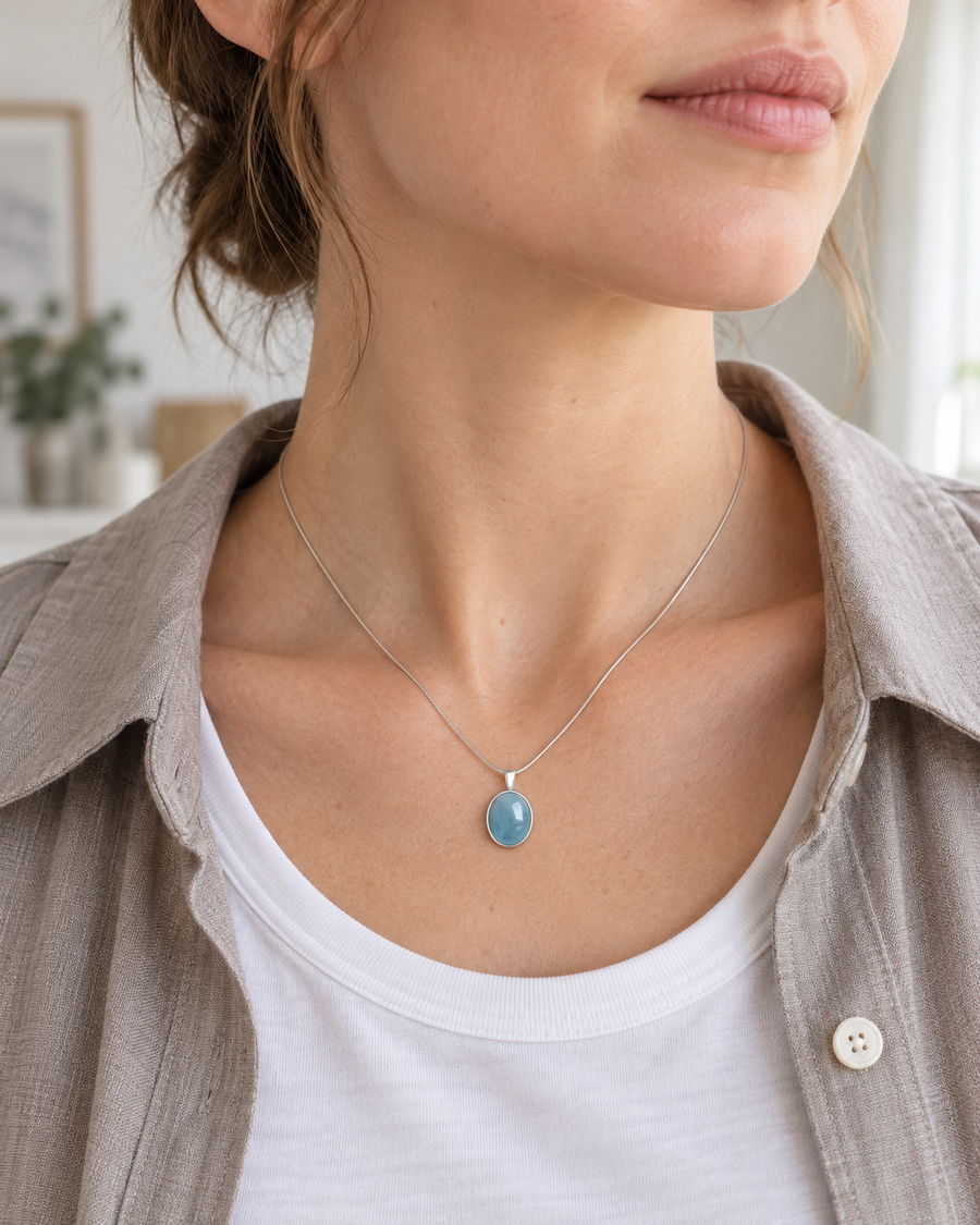 Blue Pause necklace worn with casual clothing
