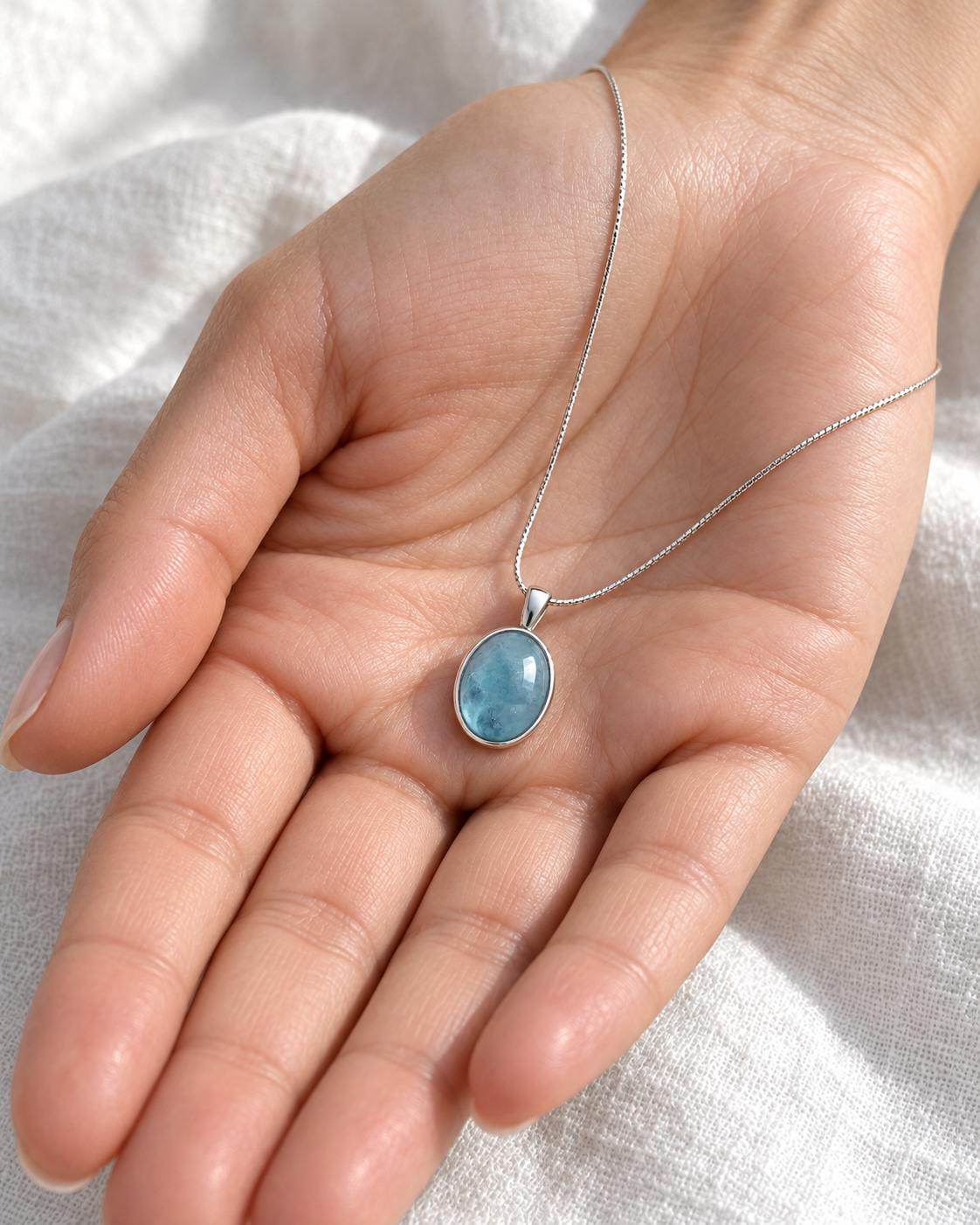 Blue Pause necklace visual scale reference