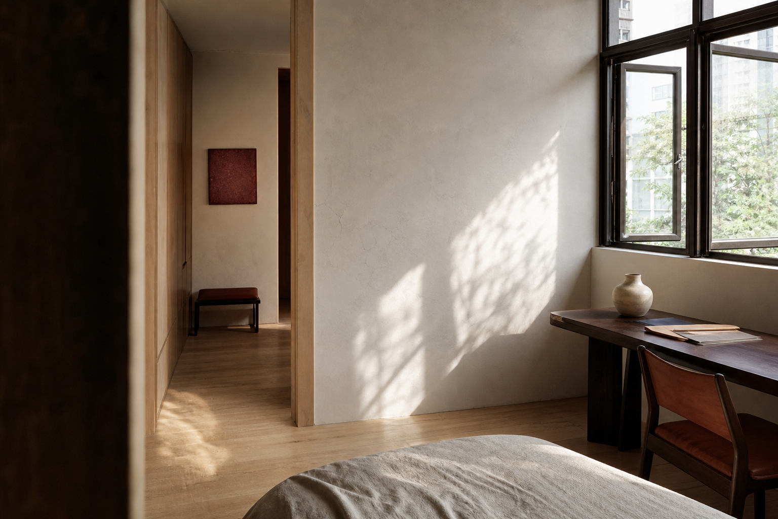 Warm daylight moving across a modern Eastern interior